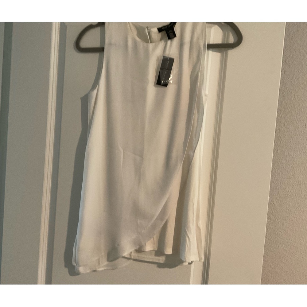 Brand new With tag White House Black Market Blouse color is White